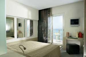 Superior double with sea view, balcony, private facilities (bath and shower), and breakfast
